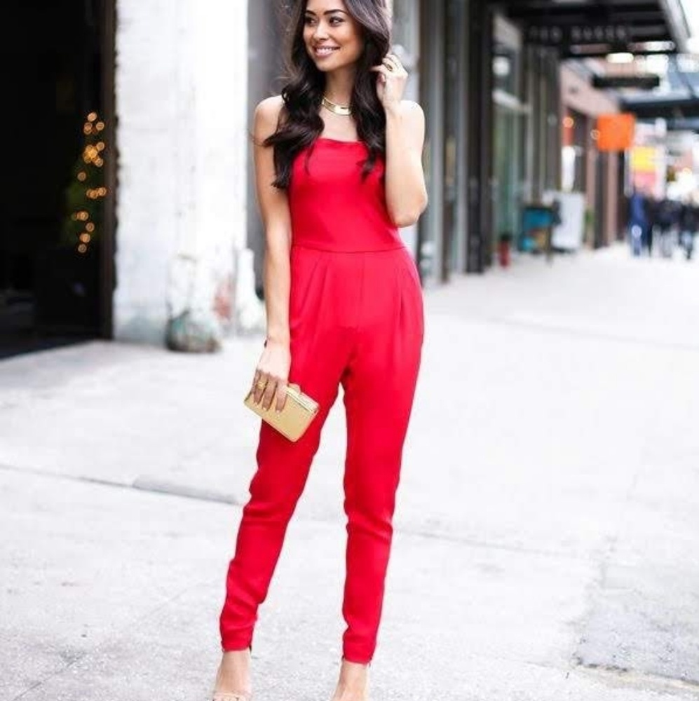 Criss cross open back red jumpsuit.